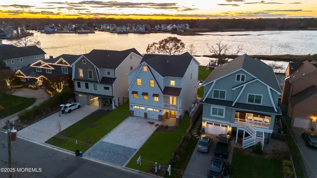 a front view of a house with a yard table and chairs
