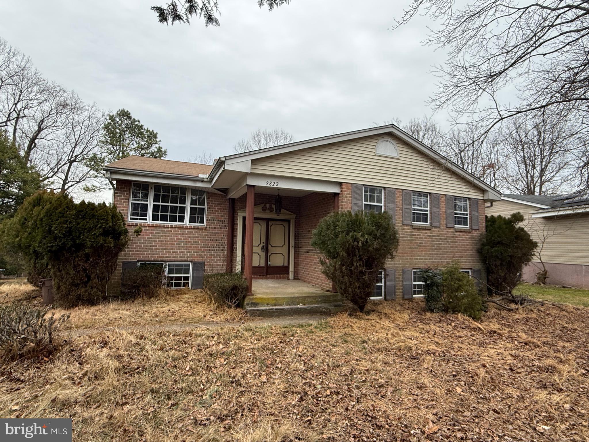 9822 Clanford Road Randallstown, MD 21133 - Photo 15 of 15 a front view of a house with garden