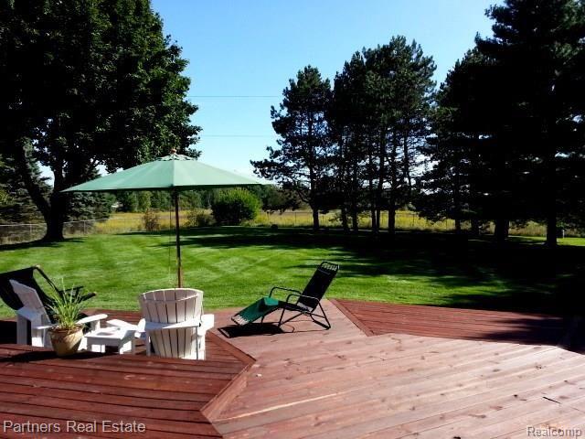 563 West Barron Road Howell, MI 48855 - Photo 5 of 35 33-Deck and Back Yard 2.jpg