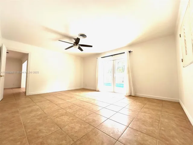 a kitchen with a refrigerator sink stove and cabinets