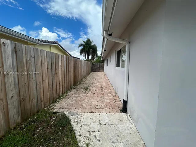 a view of pool with an outdoor space