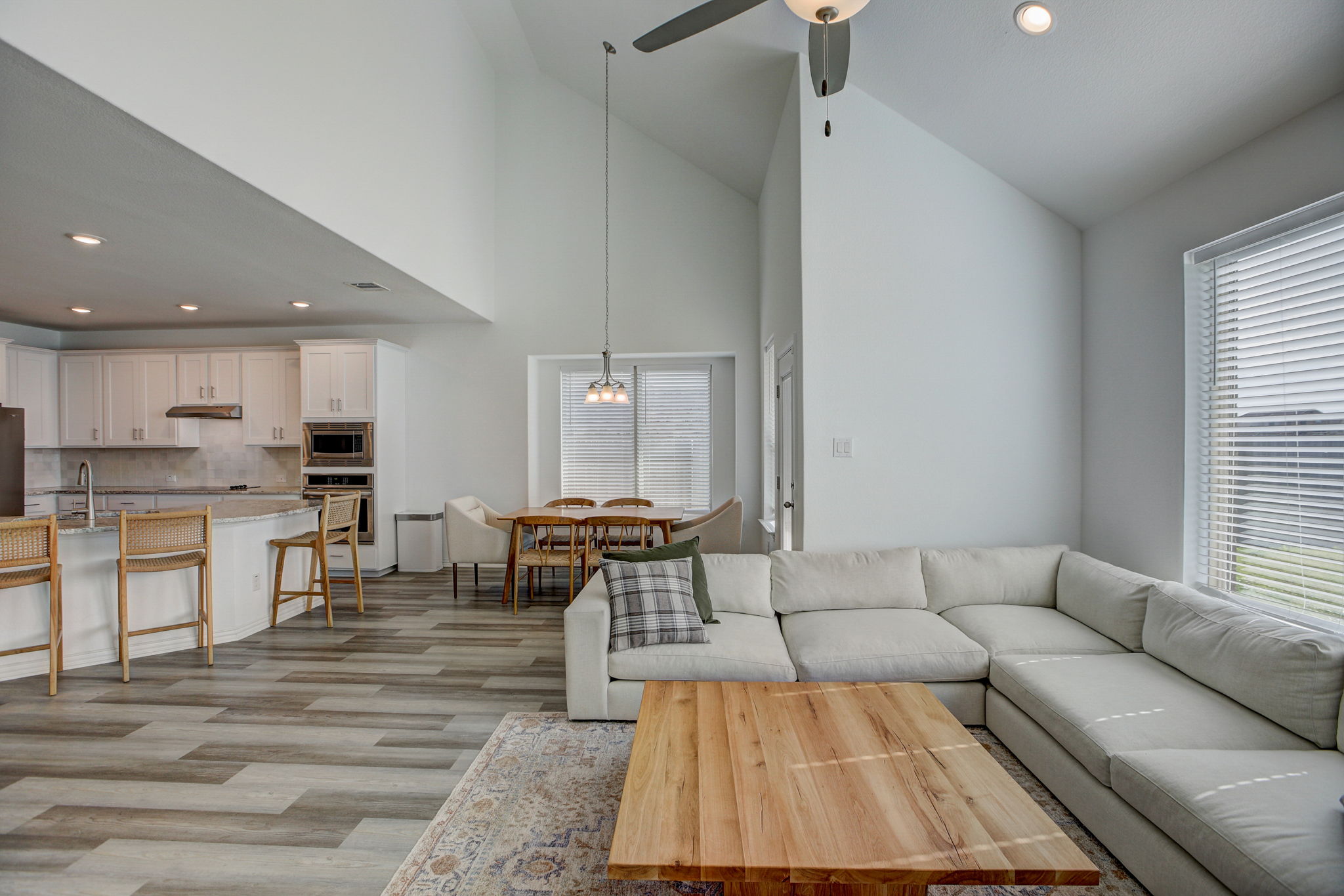 308 Monteforte Road Hutto, TX 78634 - Photo 6 of 32 a living room with furniture and kitchen view