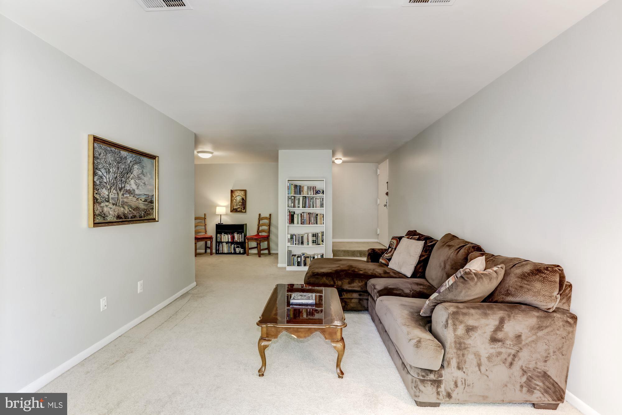 11260 Chestnut Grove Square, Unit 237 Reston, VA 20190 - Photo 11 of 37 Living room as seen from the balcony