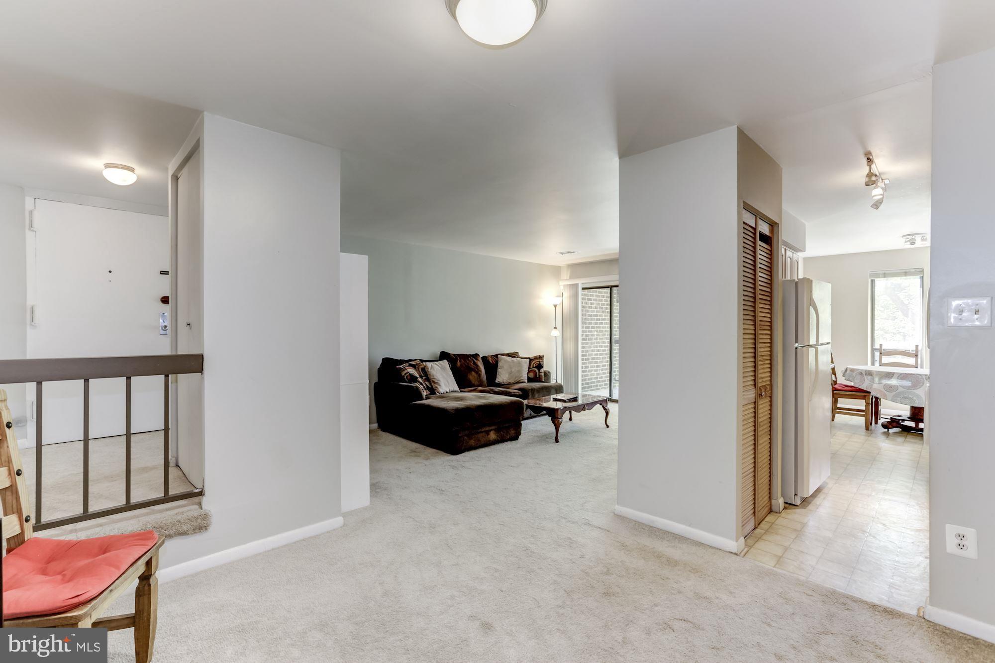 11260 Chestnut Grove Square, Unit 237 Reston, VA 20190 - Photo 15 of 37 View of open floorplan from the dining room