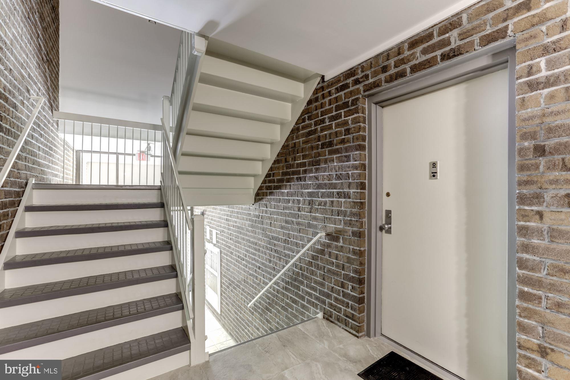 11260 Chestnut Grove Square, Unit 237 Reston, VA 20190 - Photo 3 of 37 Entry hall provides protection from the elements
