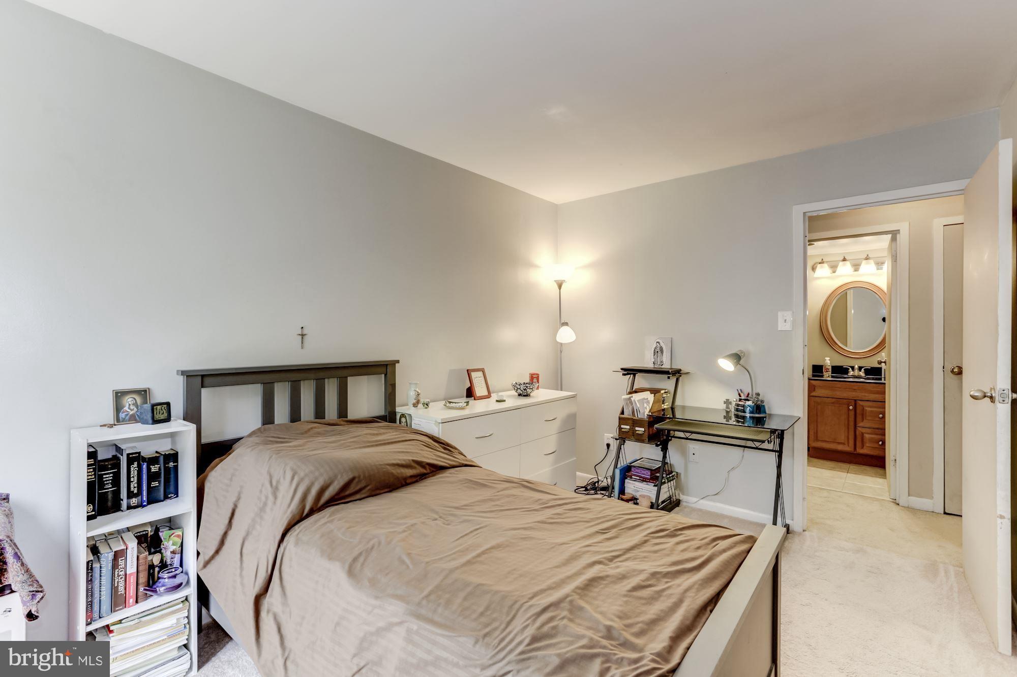 11260 Chestnut Grove Square, Unit 237 Reston, VA 20190 - Photo 27 of 37 The bedroom is convenient to the full hall bath