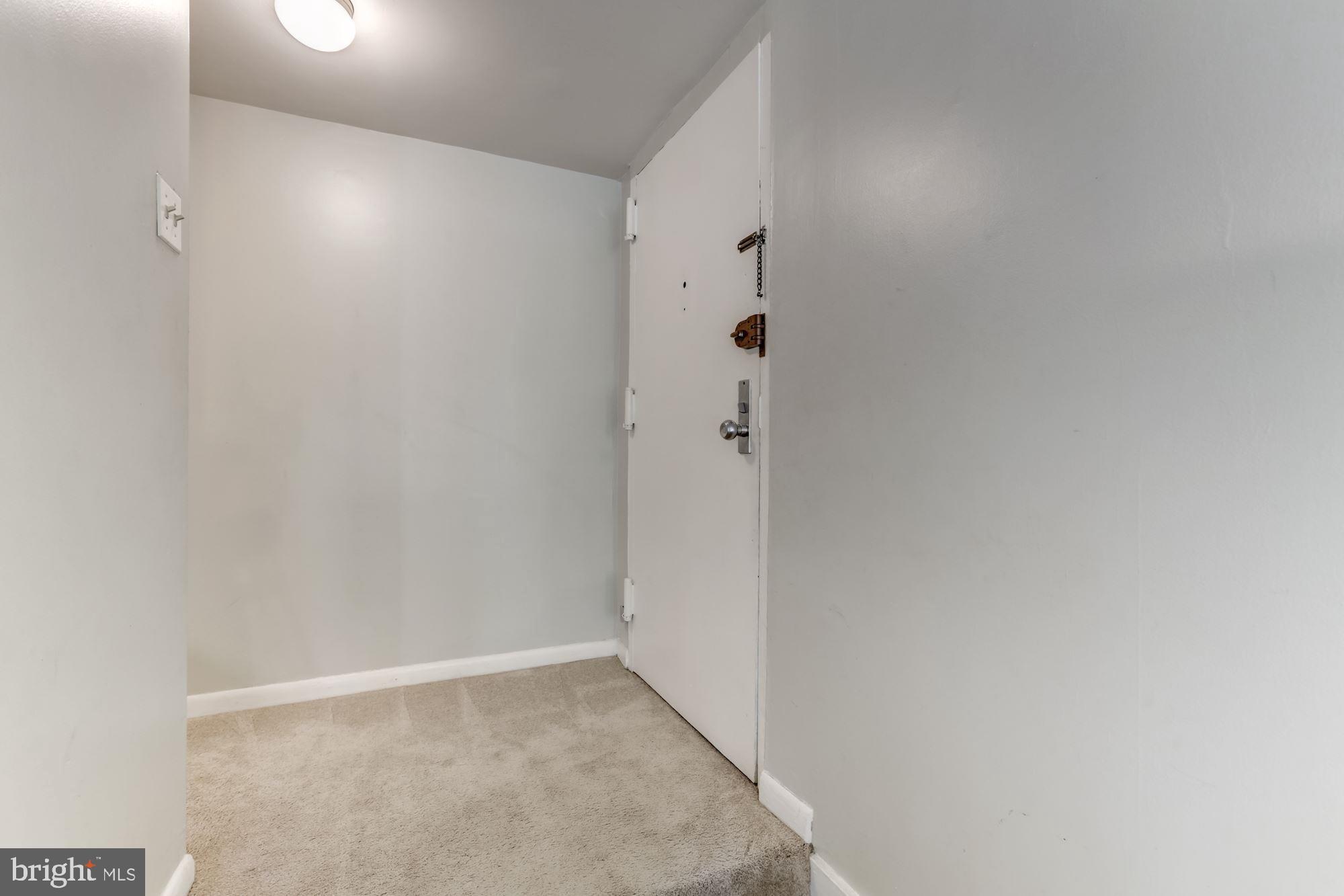 11260 Chestnut Grove Square, Unit 237 Reston, VA 20190 - Photo 4 of 37 The raised foyer offers a convenient coat closet