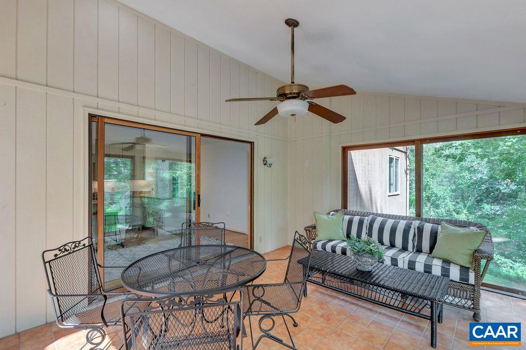 1903 Stillhouse Road Charlottesville, VA 22901 - Photo 16 of 44 a living room with furniture and a floor to ceiling window