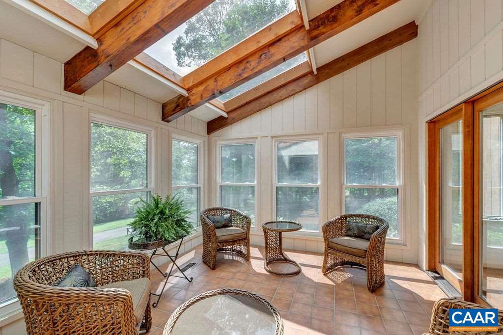 1903 Stillhouse Road Charlottesville, VA 22901 - Photo 18 of 44 a living room with furniture and a window