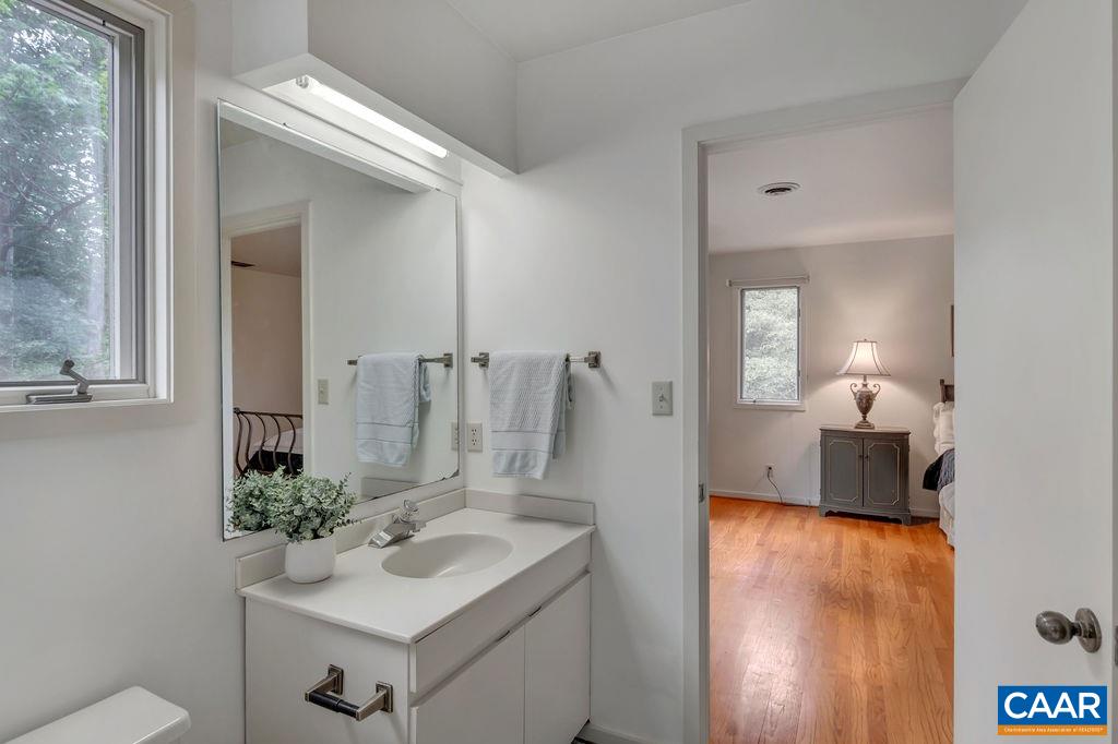 1903 Stillhouse Road Charlottesville, VA 22901 - Photo 27 of 44 a bathroom with a sink and a mirror