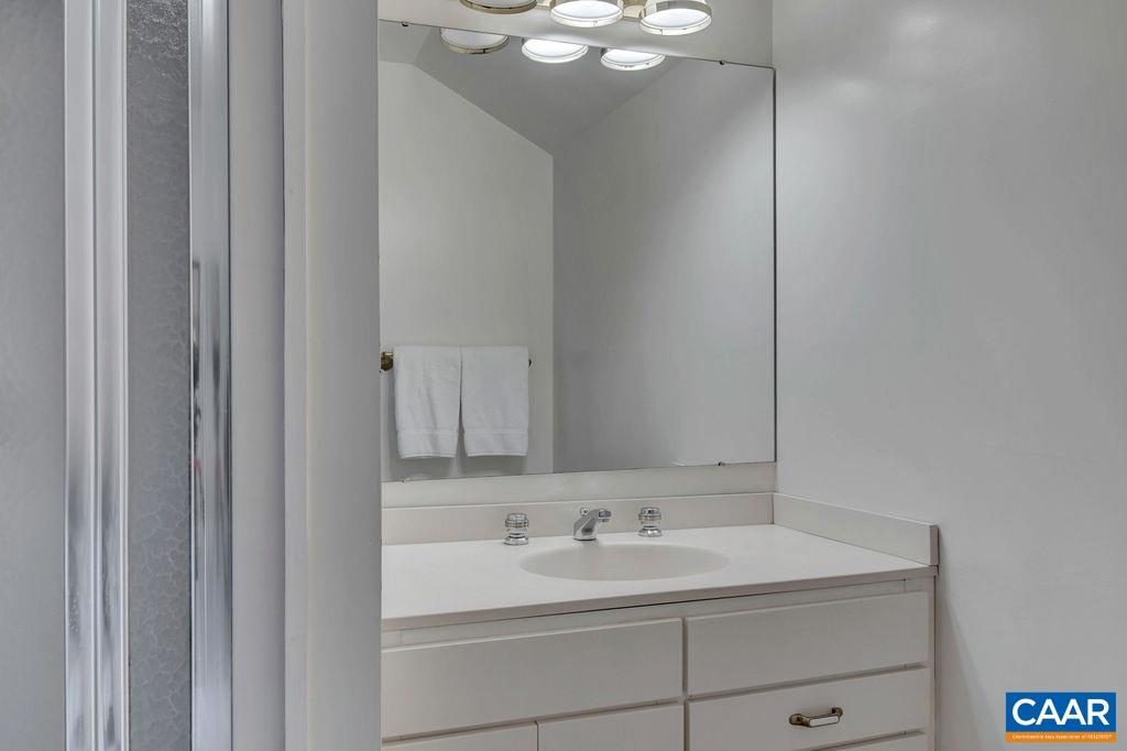 1903 Stillhouse Road Charlottesville, VA 22901 - Photo 31 of 44 a bathroom with a sink and a mirror
