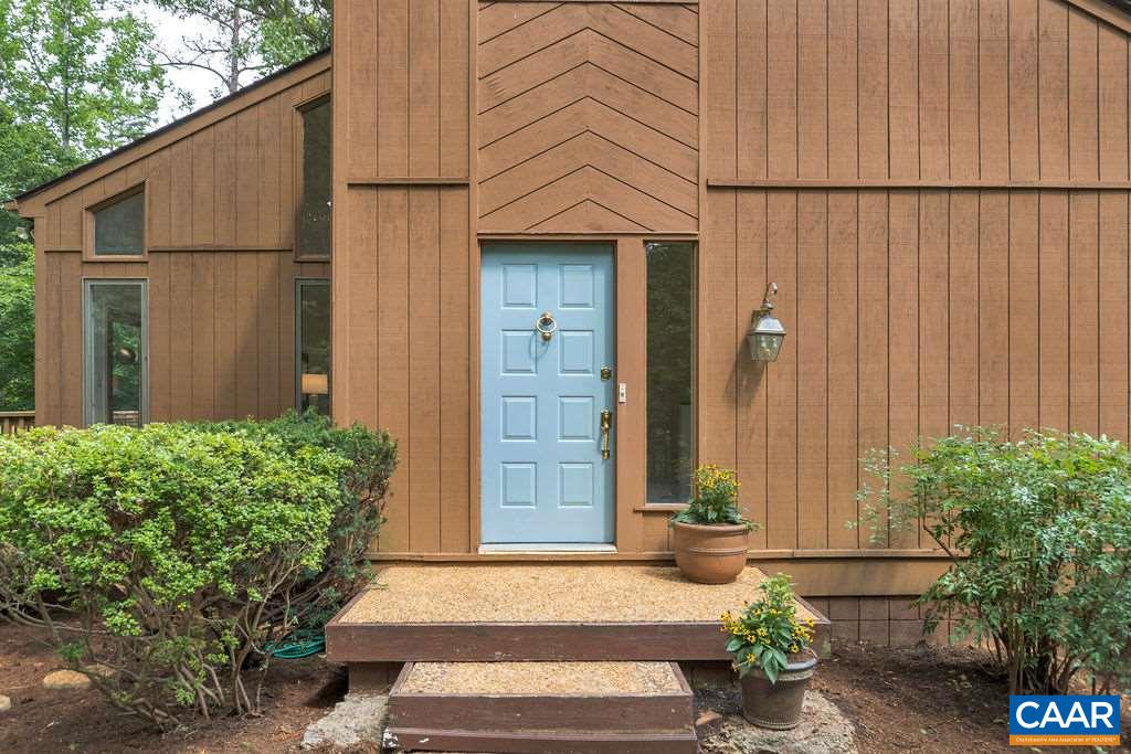 1903 Stillhouse Road Charlottesville, VA 22901 - Photo 4 of 44 a front view of a house with a garden
