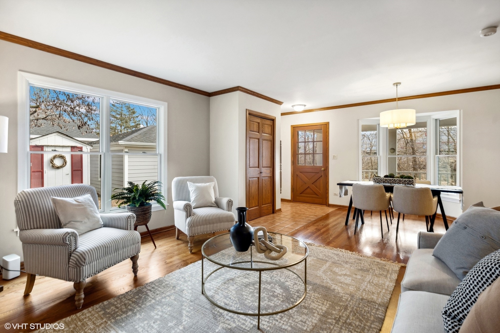 557 Riford Road Glen Ellyn, IL 60137 - Photo 11 of 25 a living room with furniture or couch and a large window