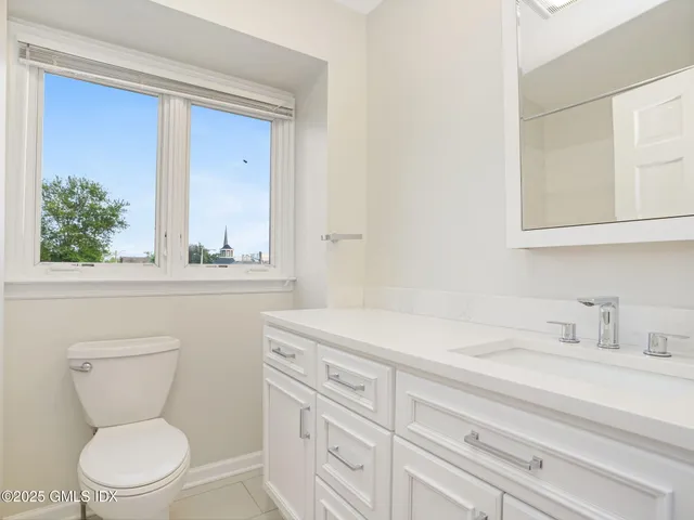 a bathroom with a tub and a sink