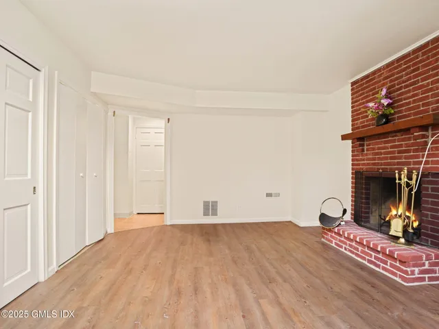 a utility room with cabinets washer and dryer