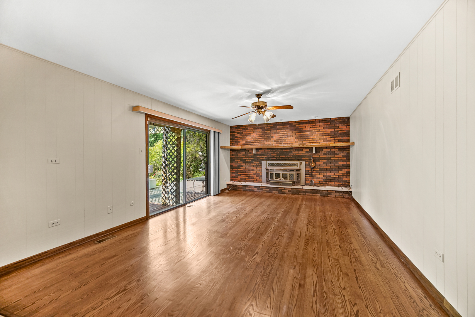 13105 Maple Road Mokena, IL 60448 - Photo 8 of 35 wooden floor in an empty room with a window