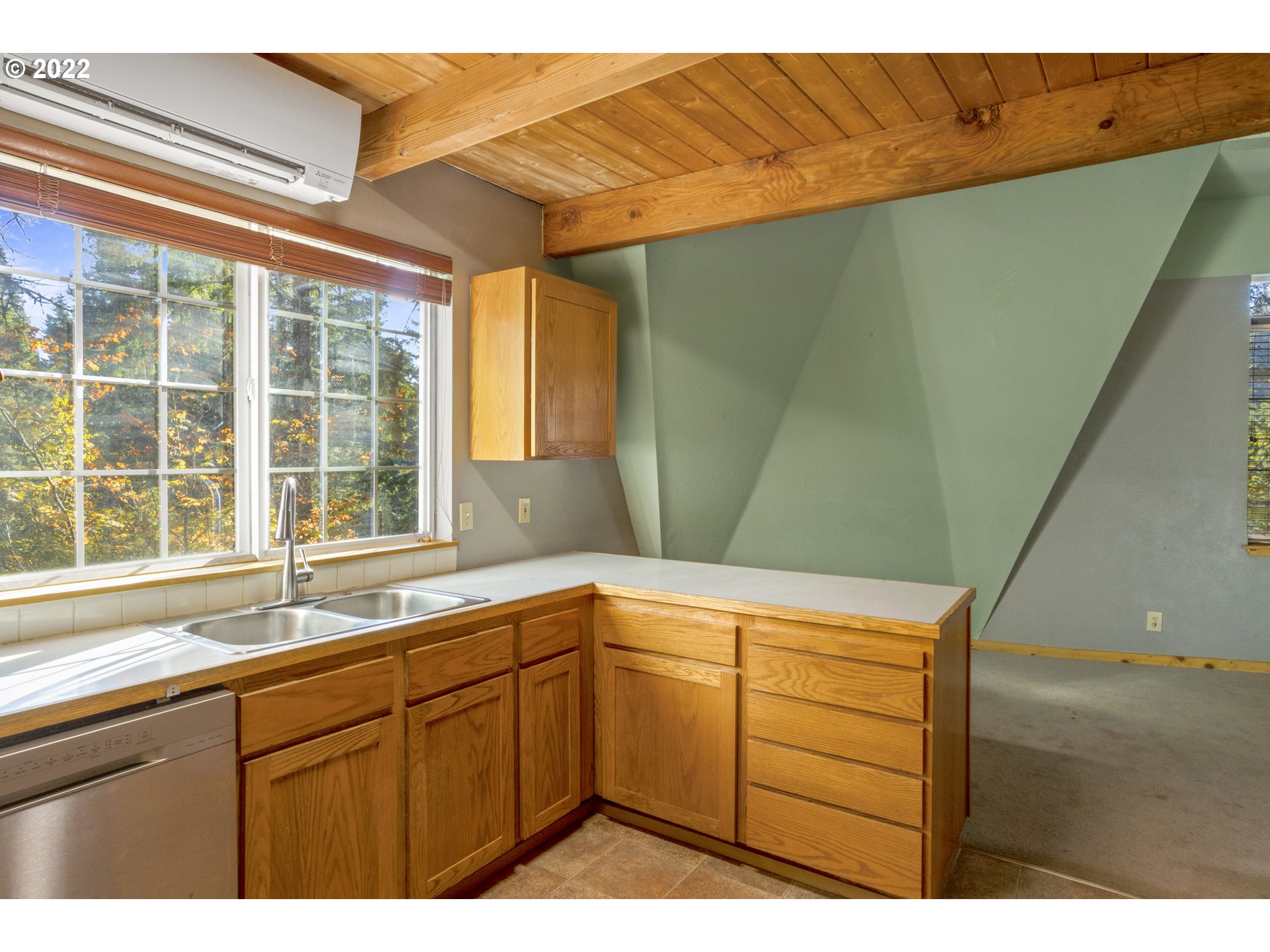 70 Moore Road White Salmon, WA 98672 - Photo 8 of 30 a kitchen with a sink and large window