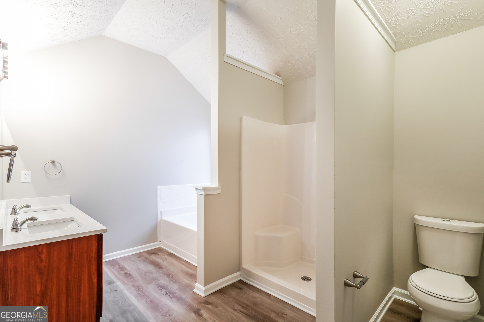 210 Heaton Pl Trail Covington, GA 30016 - Photo 8 of 17 a bathroom with a sink and a mirror