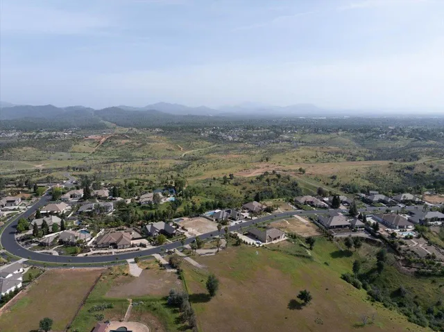 an aerial view of a city with lots of residential buildings