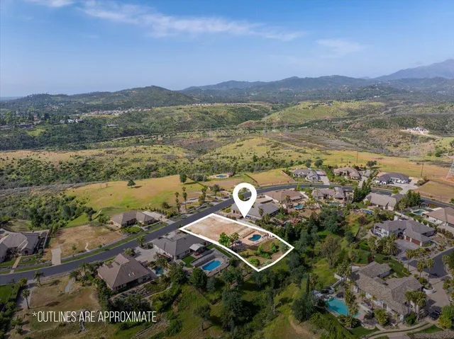 an aerial view of lake residential house and outdoor space