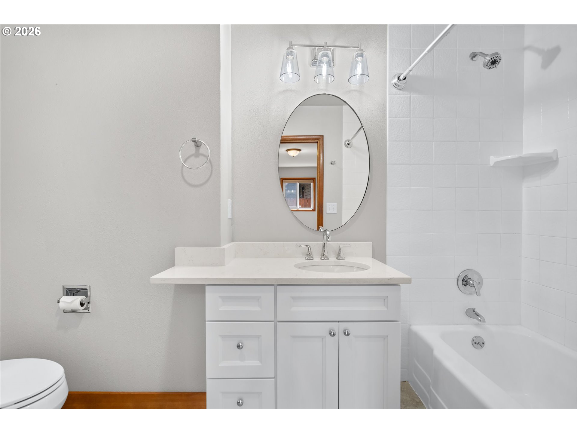 11345 Southwest 92nd Avenue Portland, OR 97223 - Photo 30 of 47 a bathroom with a sink a toilet and a mirror