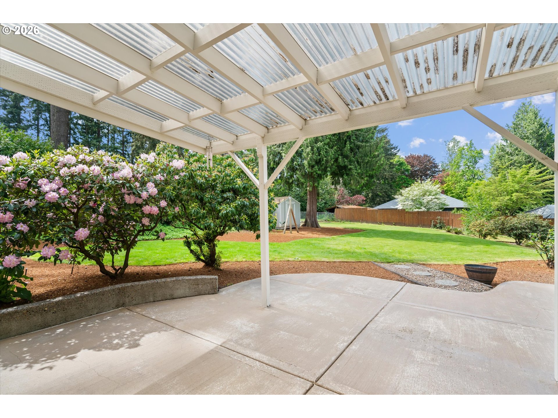 11345 Southwest 92nd Avenue Portland, OR 97223 - Photo 37 of 47 a view of a park with potted plants and a palm tree