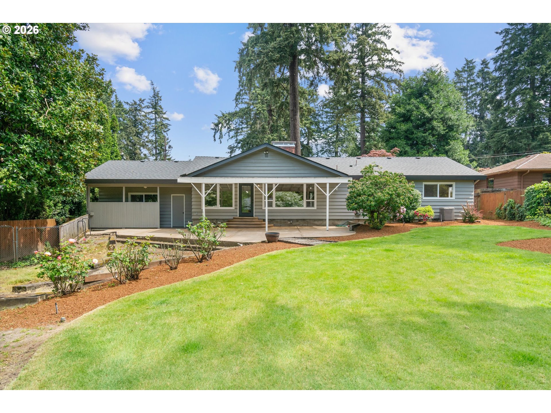 11345 Southwest 92nd Avenue Portland, OR 97223 - Photo 45 of 47 a front view of a house with garden