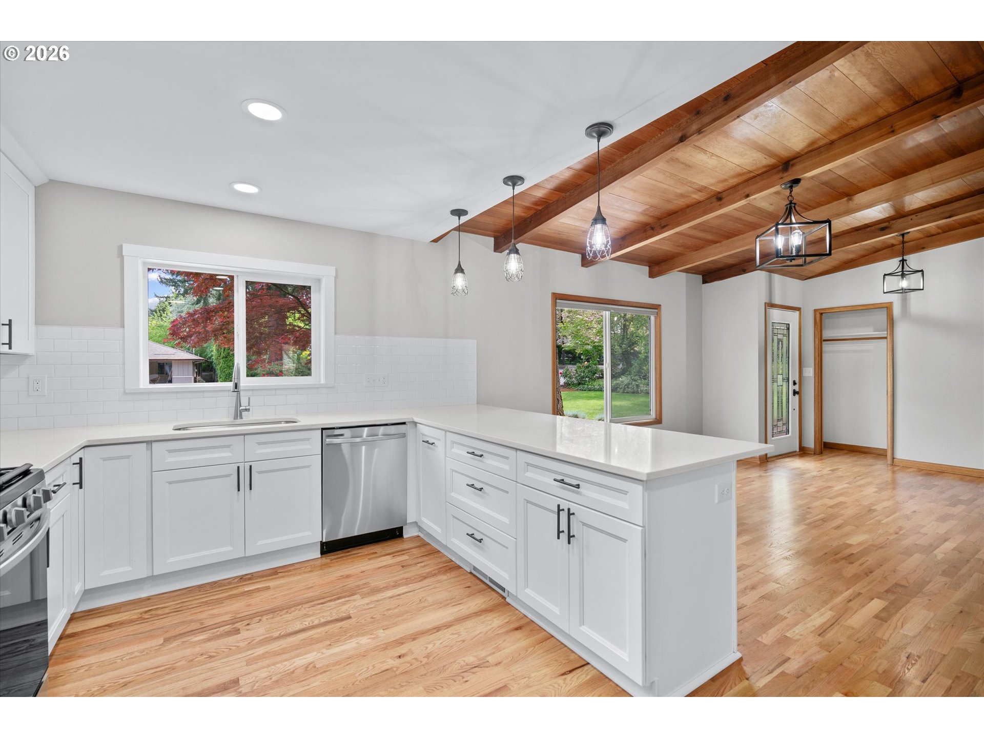 11345 Southwest 92nd Avenue Portland, OR 97223 - Photo 10 of 47 a large white kitchen with a window