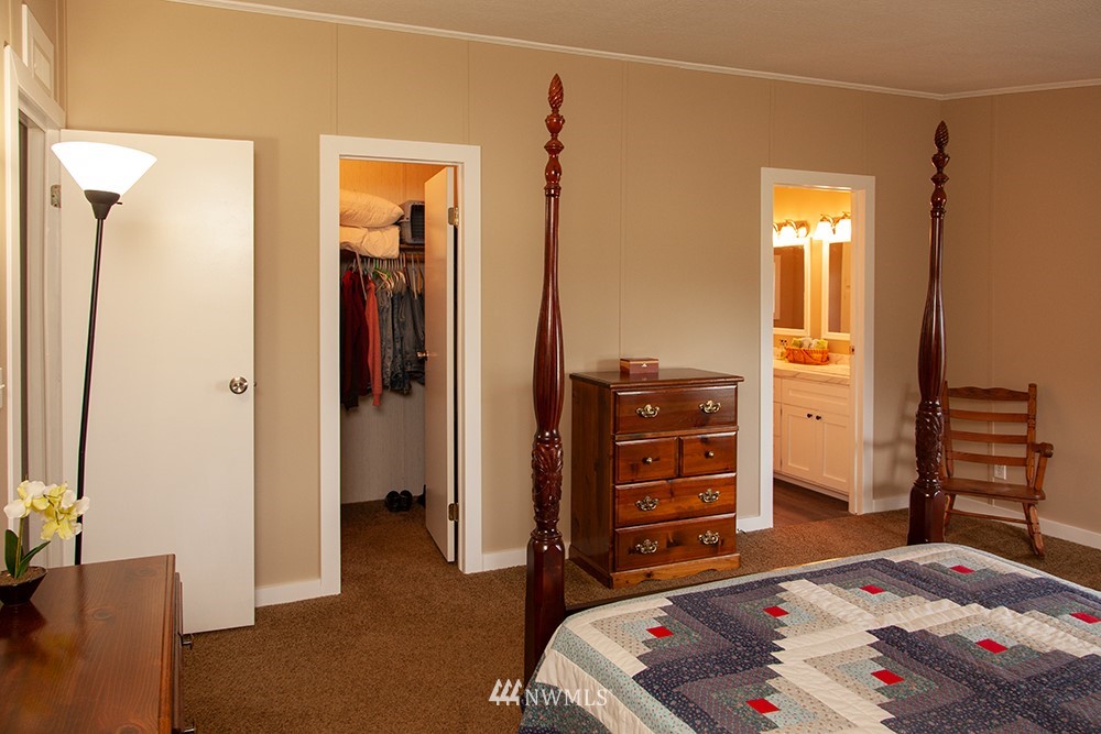 2977 East Smith Road Bellingham, WA 98226 - Photo 20 of 26 a bedroom with a bed and furniture