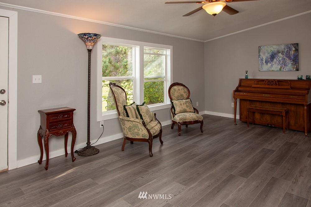 2977 East Smith Road Bellingham, WA 98226 - Photo 4 of 26 a living room with furniture a piano and a window