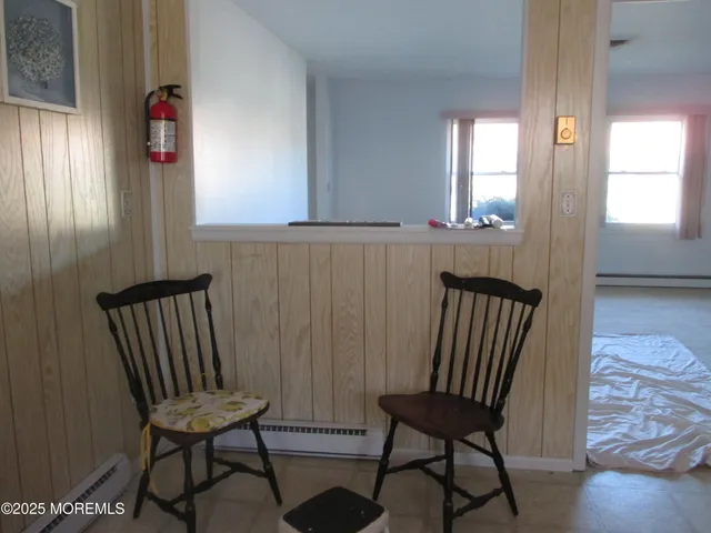 a bathroom with a sink a toilet and window