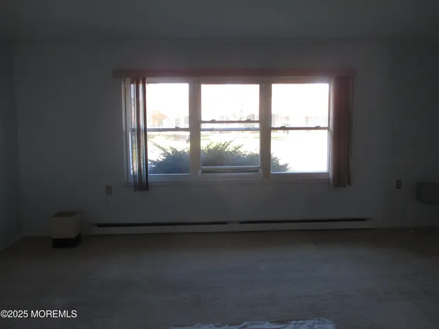 a kitchen with a stove and a microwave