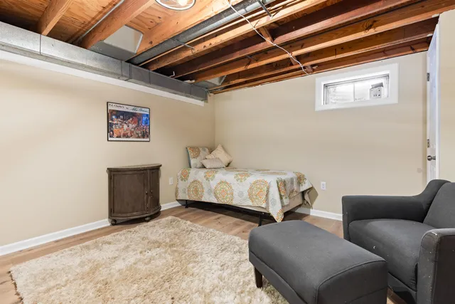 a bedroom with furniture and a bed