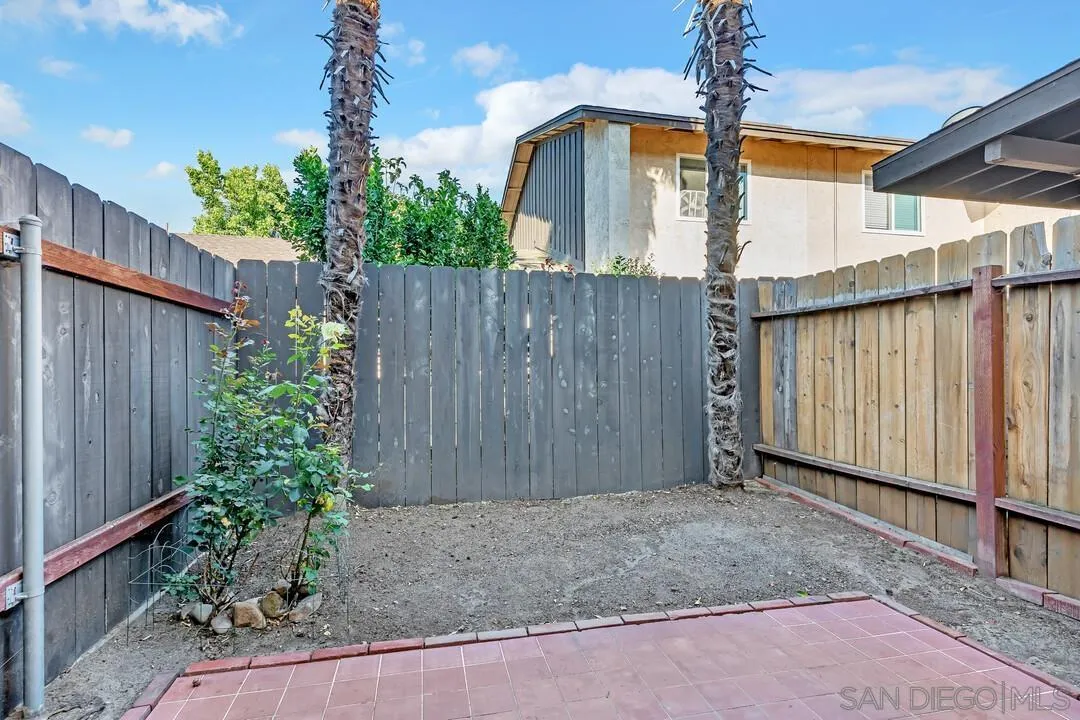 10258 Carefree Drive Santee, CA 92071 - Photo 21 of 30 a view of a house with a backyard and potted plants