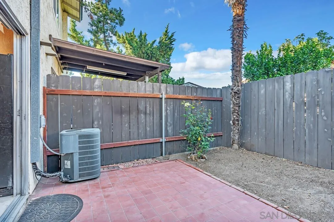 10258 Carefree Drive Santee, CA 92071 - Photo 22 of 30 a backyard of a house with a table and chairs