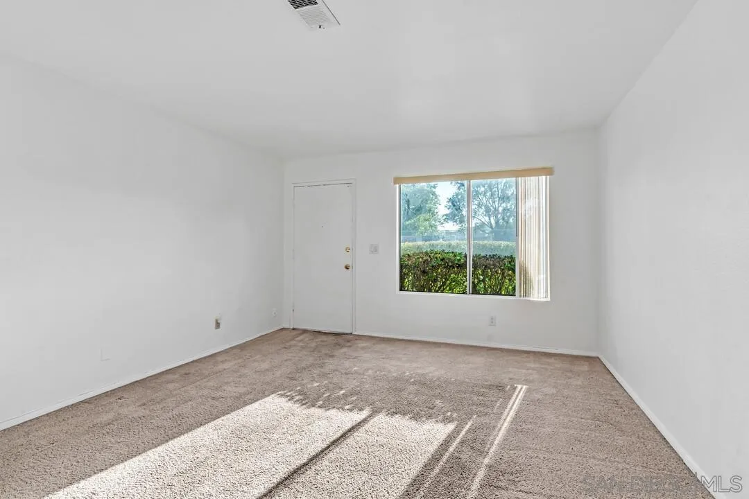 10258 Carefree Drive Santee, CA 92071 - Photo 4 of 30 an empty room with a window