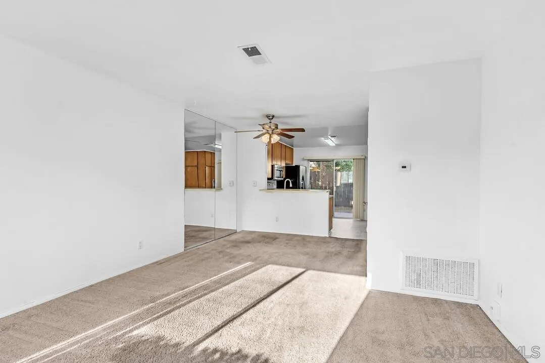 10258 Carefree Drive Santee, CA 92071 - Photo 6 of 30 a view of a kitchen with a sink and cabinet