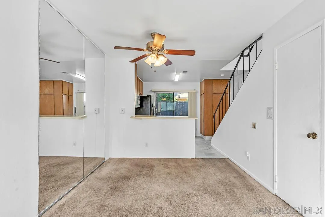10258 Carefree Drive Santee, CA 92071 - Photo 8 of 30 a view interior of a house with wooden floor and windows