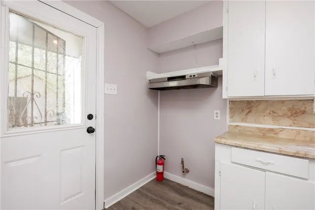 a view of a storage and utility room