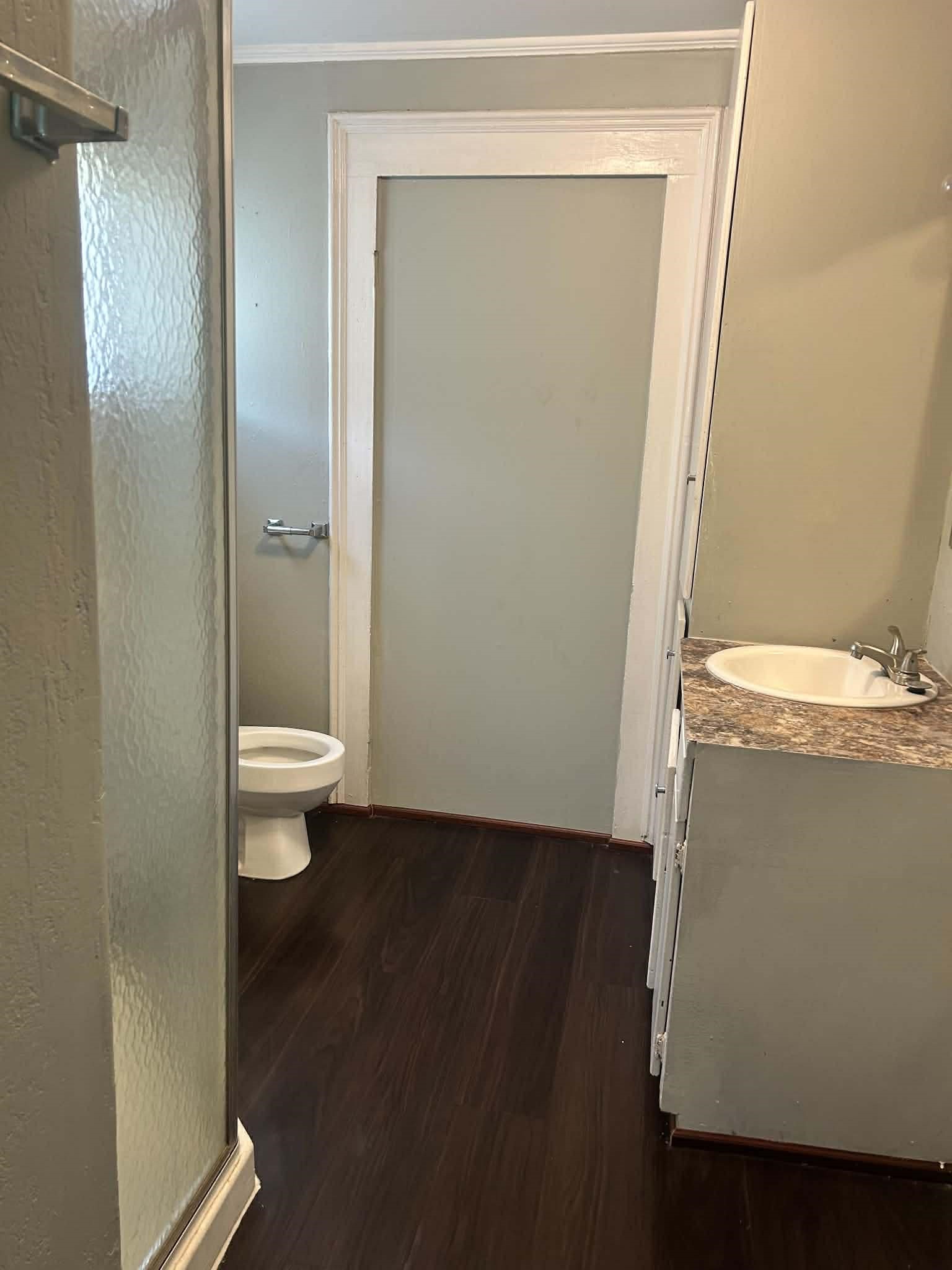 11 Smith Street Shepherd, TX 77371 - Photo 25 of 31 a view of a room with wooden floor and sink