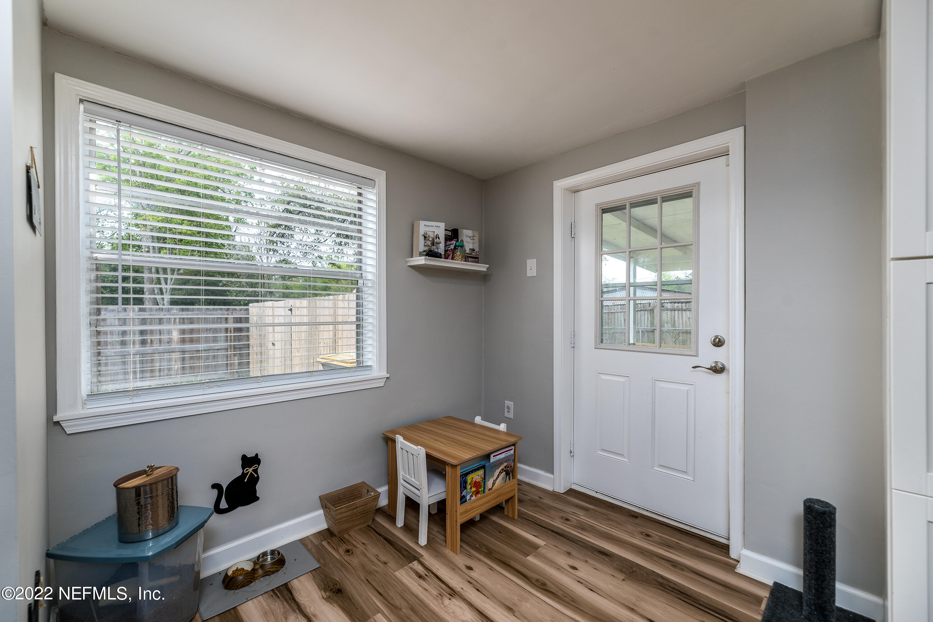 5807 Ricker Road Jacksonville, FL 32244 - Photo 16 of 31 a room with furniture and a window