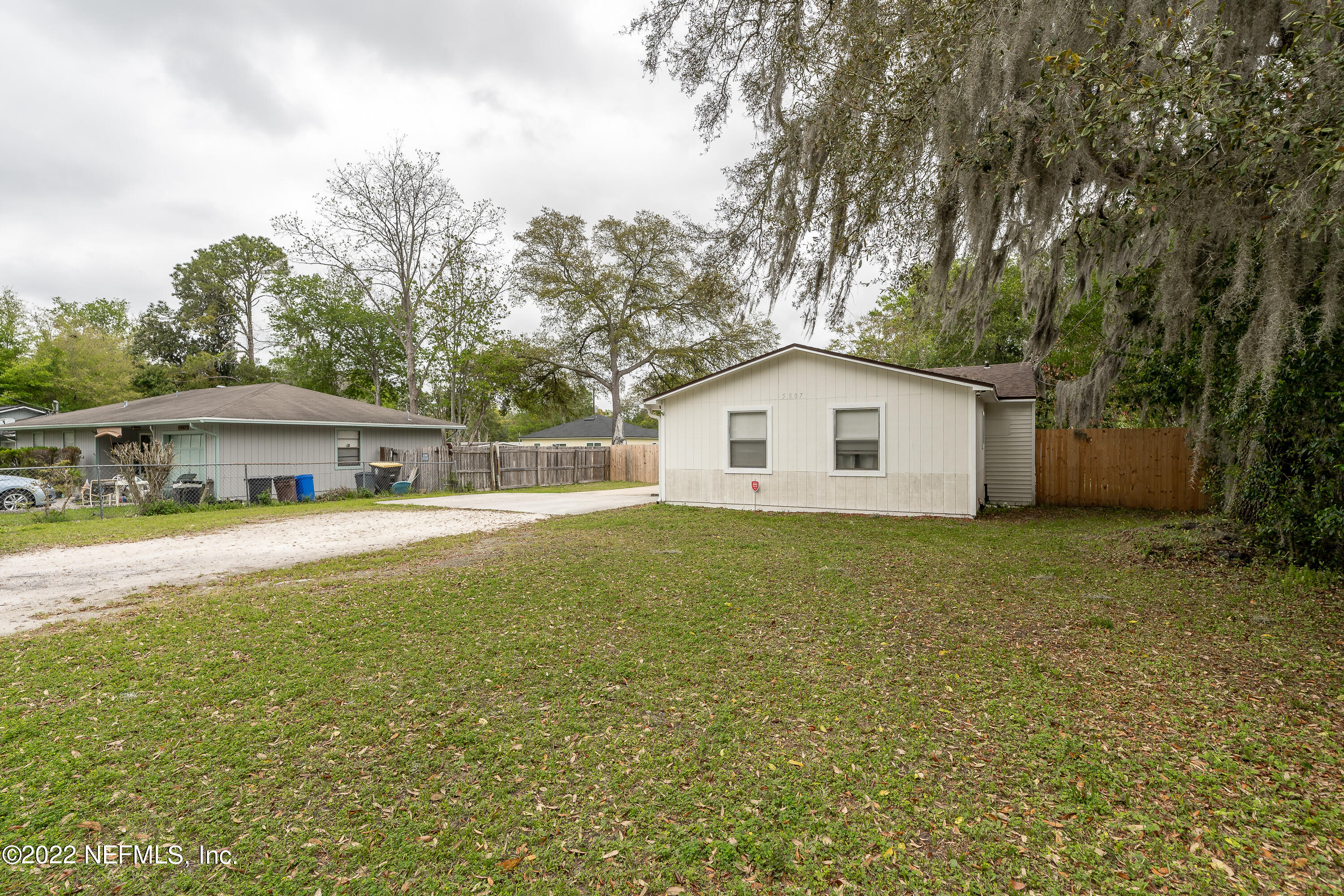 5807 Ricker Road Jacksonville, FL 32244 - Photo 2 of 31 a house view with a outdoor space
