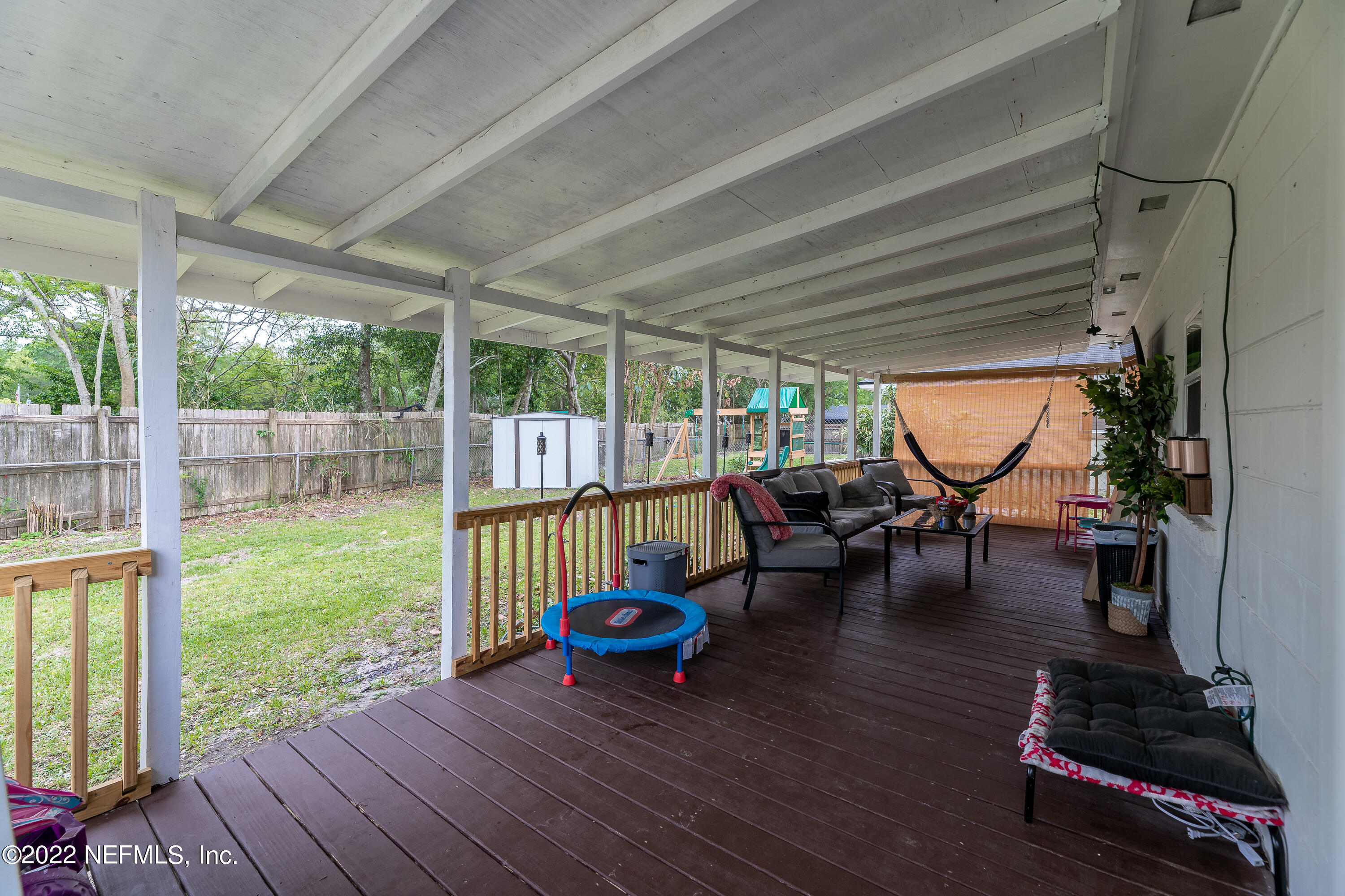 5807 Ricker Road Jacksonville, FL 32244 - Photo 25 of 31 a view of a backyard with sitting area