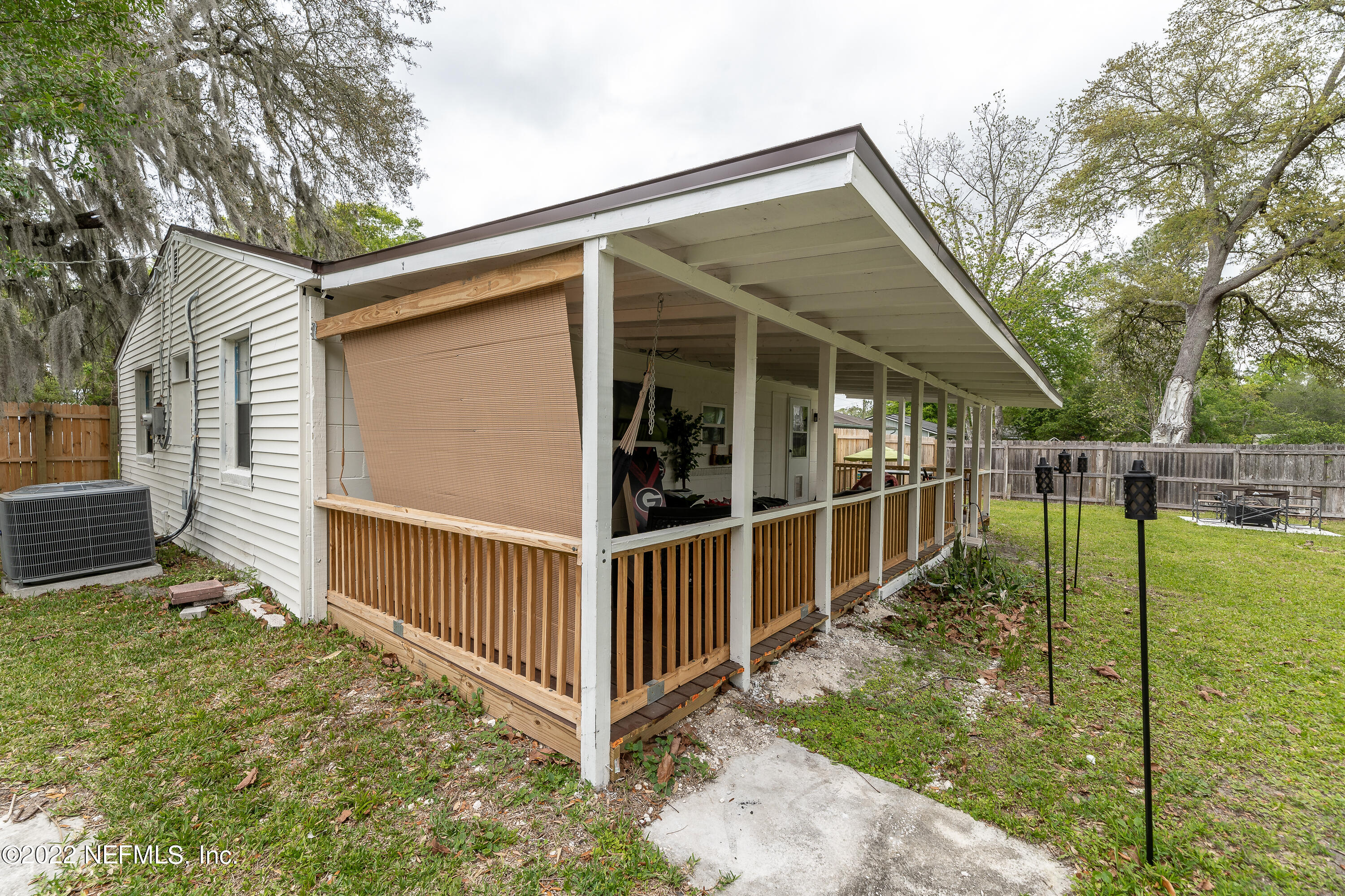 5807 Ricker Road Jacksonville, FL 32244 - Photo 27 of 31 a view of backyard with small cabin