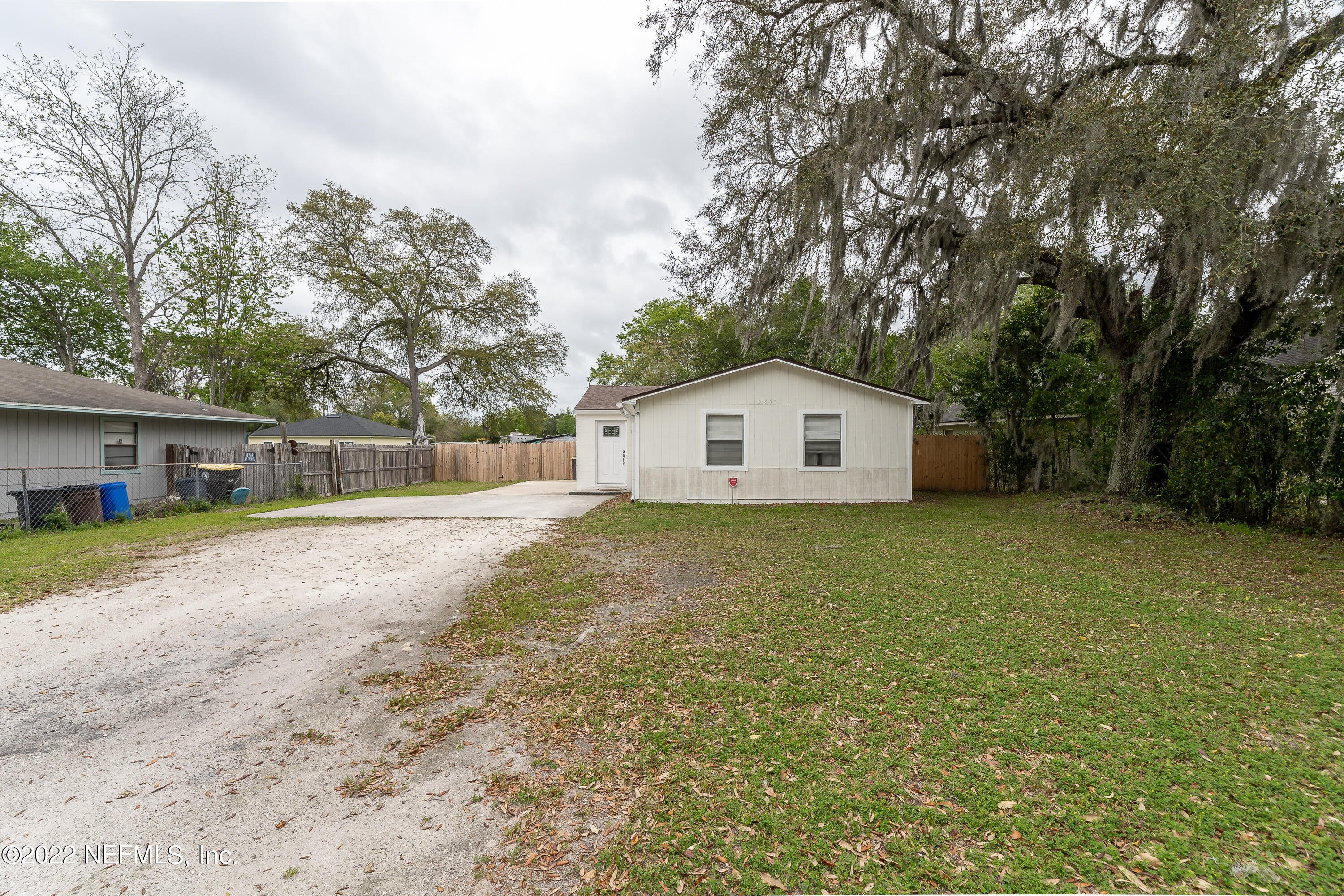 5807 Ricker Road Jacksonville, FL 32244 - Photo 4 of 31 a bathroom with a sink and a yard