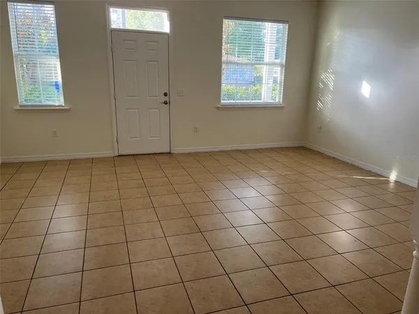 a view of an empty room and window