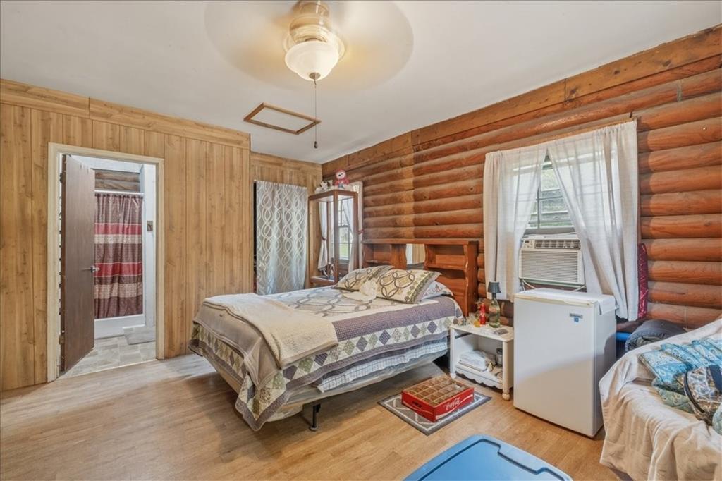 266 Anderson Road Rockmart, GA 30153 - Photo 20 of 31 a bedroom with a bed and a window
