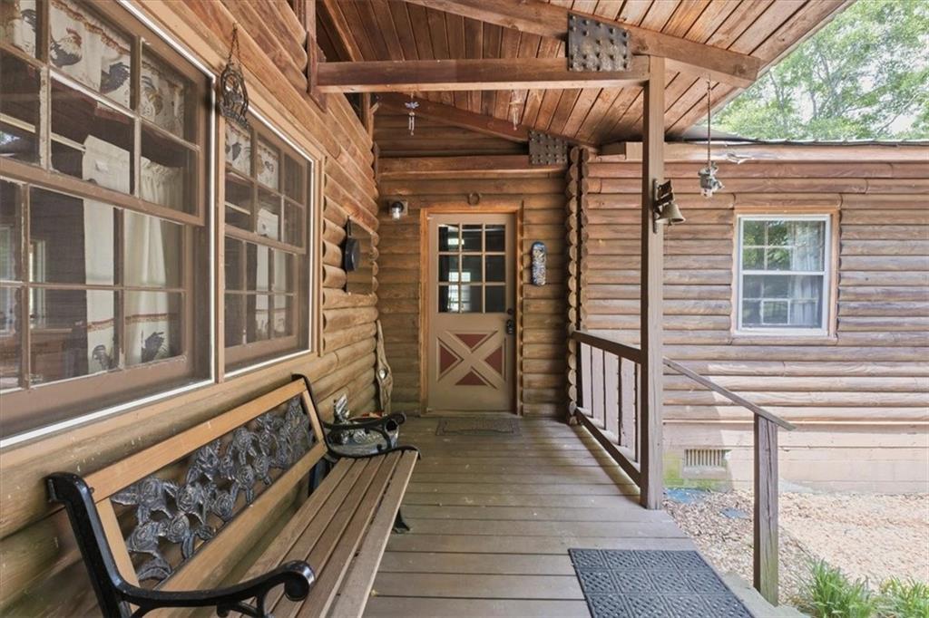 266 Anderson Road Rockmart, GA 30153 - Photo 6 of 31 a view of a balcony with chairs