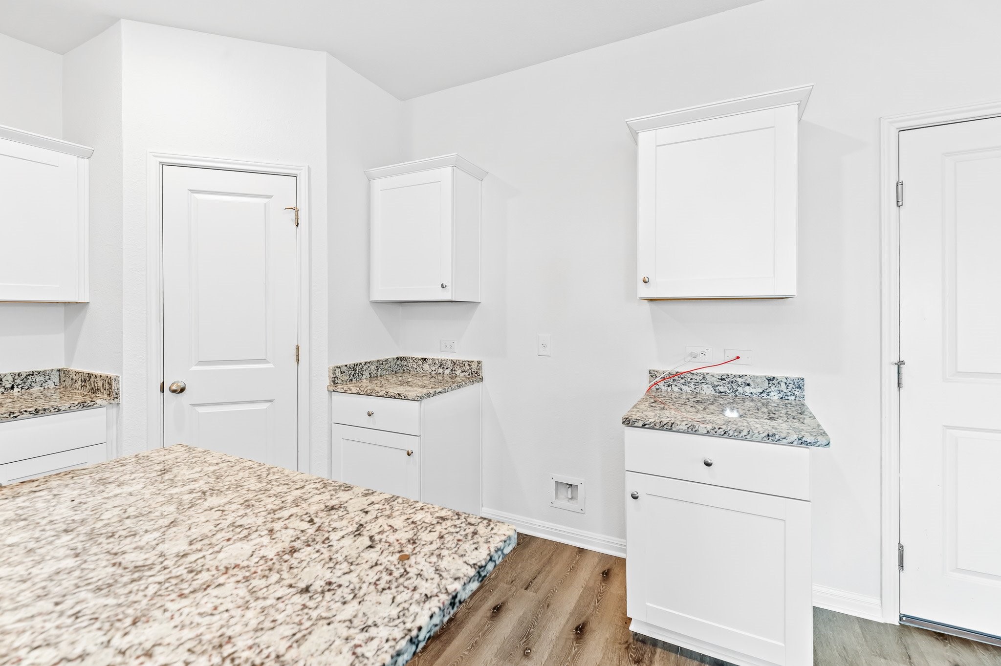 224 Night Riders Way Jarrell, TX 76537 - Photo 12 of 40 a room with a bed and cabinets