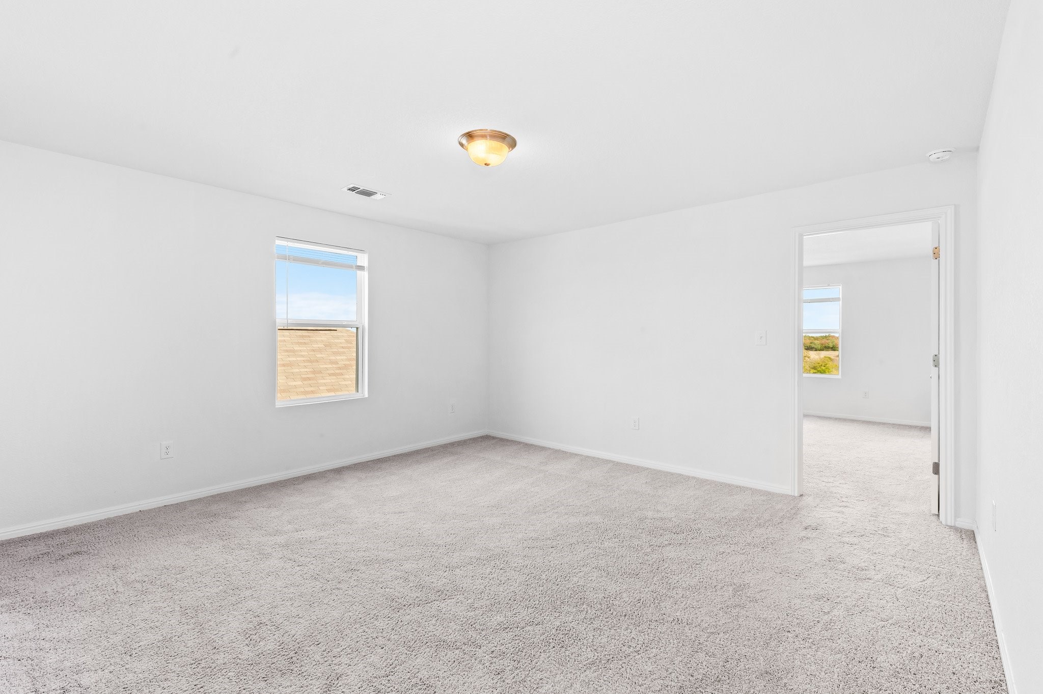 224 Night Riders Way Jarrell, TX 76537 - Photo 29 of 40 an empty room with windows